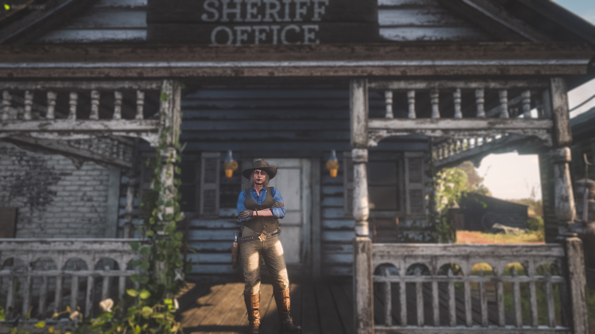 Sheriff Harriet Beaver standing in front of the Rhodes Sheriff Office